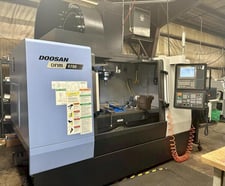 Daewoo Doosan #DNM-5700, 4th axis rotary table, 41" X, 22" Y, 20" Z, #40 taper, 15000 RPM, 40 automatic tool