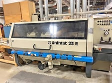 Weinig #Unimat-23E-ATS, feed-through moulder, 6-head, 9-1/16" x 6" profiling capacity, 18-118 FPM, 1998