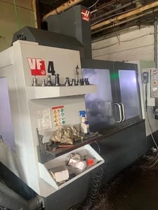 Haas #VF-4, CNC vertical machining center, 24+1 side mount tool changer, 50" X, 20" Y, 25" Z, 8100 RPM, #40