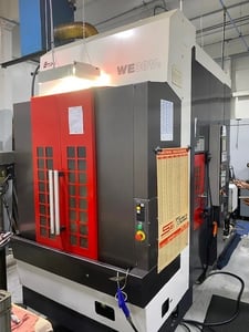 Enshu #WE30VE, CNC vertical machining center, 21 automatic tool changer, 27.5" X, 15.7" Y, 11.8" Z, 12000