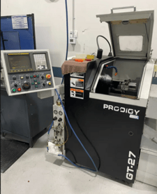 SNK Prodigy #GT-27, gang tool, GE Fanuc Oi Mate-TB, 9.4" swing, 4" chuck, 1" bar, 5C, 2006