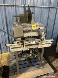 Action Packaging Autocard #ST2, automatic header card applicator, up to 25 cycles per min, 2 cards per cycle