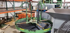 Wire Turn Table, 63" diameter End to End, 36" floor to top of leg, 31" width Post to Post