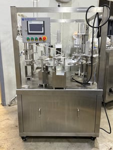 Snowball Machinery #SNFL4, Rotary Ice Cream Filling Machine, 1500-4000 capacity, 220 V., 3 phase, .5-.6 bar