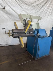 7500 lb. Rowe #7530-D/SL, Uncoiler, 30" width, 60" outside dimensions, 16"-20" ID, manual expansion, powered