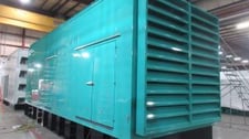 800 KW Caterpillar #3412, diesel generator set, 277/480 Volts, 878 hours, sound attenuated enclosure, 1999