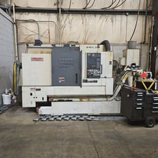 Mori Seiki #NL-2500MC/700, CNC lathe, 36" swing, 3" bar, 14" dia., 27.5" lgth, 25 HP, 4000 RPM, 5-Axis, chip