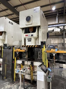 200 Ton, Aida #NC1-2000(2)E, single crank gap frame press, 54.7" x 33.1" bed, 9.84" stroke, 25-50 SPM, 4.33"