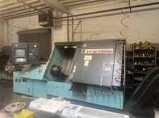 Warner & Swasey #M-5940, 12" chuck, Fanuc 10T, 3.5" hole, 1990