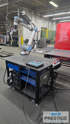 Universal Robots Cobot, HireBotics, Miller 352MPa welder, Tregaskiss welding gun, 32" x 48" welding table