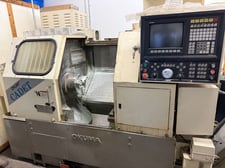 Okuma #Cadet-LNC-8, CNC lathe, 15.7" swing, 8" chuck, 2" bar, chip conveyor, tailstock