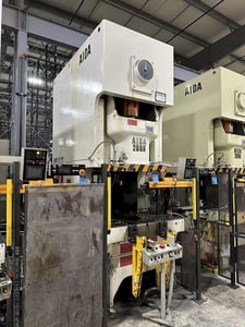 220 Ton, Aida #NC1-2000(2), single crank gap frame press, 9.84" stroke, 17.72"Shut Height, 4.33"adj., 25-50