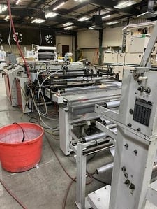 56" Split roll sideweld machine, FMC, edge guided unwind, vent punches