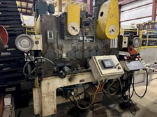 30000 lb. U.S. Industrial #M24, coil-feedline, 42" width, 30"-72" OD, 20"-24" ID, 12" pinch roll diameter