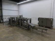 Douglas #AXIOM-WA-IM, Case Packer Wrap Around, 5-45 cases trays/min, AB PLC Control