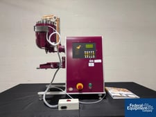 Pharmag Suppository Filler, benchtop design, agitated product hopper, speeds up to 4000 suppositories/hour