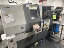 Samsung #SL-15, CNC lathe, 17.7" swing, 6" chuck, 1.7" bar, 11.81" dia., tailstock, chip conveyor