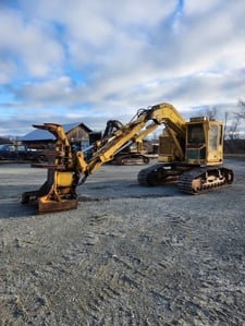 John Deere #653 Feller Buncher, 13500 hours (1500 hours on refurbished engine), runs well, 1996