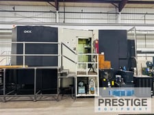 OKK #HM-1250S, 4-Axis, Fanuc 310i-SA, 67" X, 55" Y, 49" Z, 2 APC 49" pallets, 60 automatic tool changer, thru