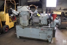 Cincinnati No. 107-4, centerless grinder, 4.75" work capacity, 3" diameter work rest capacity, 8" Infeed, 24"