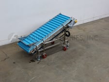 304 Stainless Steel inclined cleated conveyor, 24" wide x 74" long food grade belt