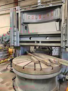 72" Colburn, 75" swing, 48" under rail, 2 rams, 1970