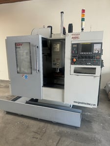 Ganesh #VMC-2818, CNC vertical machining center, 24 arm automatic tool changer, 28" X, 18" Y, 20" Z, 8000