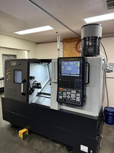 Daewoo Doosan #Lynx-2100LB, CNC turning center, 6" chuck, 2-jaw, Fanuc I, 12 turret, tailstock, Royal FX 575