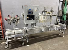 Ideal #SE2-BFM, 2 spout filler with pnuematic lid closers, Allen Bradley processor, 120 V., 2006