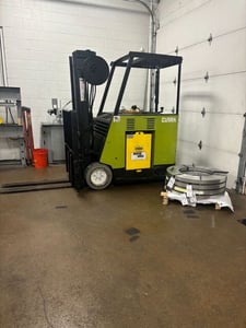 3800 lb. Clark #ESM1125, standup electric forklift, 186" lift height, 24" load center, batteries & charger