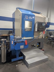 21.6" Hyundai #Hit-V5R, CNC vertical turret lathe, Fanuc 21iT, 31.5" swing, 15" chuck, 3000 RPM, 30 HP, 1999