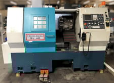Akira-Seiki #SL-40, CNC lathe, 29.5" swing, 12" 3-jaw chuck, 3" bar, 19" diameter, 27" length, Fanuc Oi-TC