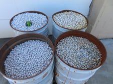 Alumina pebble mill media, 4400 lb., 4 drums, 1 pallet, 7/8" x 3/4" & down