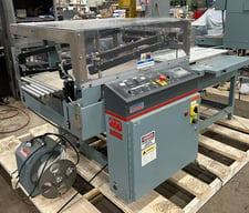 Shanklin #A27A, automatic L-bar sealer, 21" W x 33" L x 7.5"H seal area, up to 35 pkgs/minute