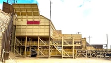 Mining Truck dump structure with apron feed & cab