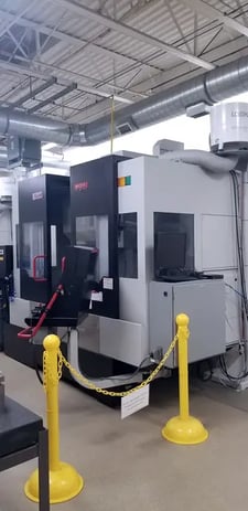 Quaser #MV204E/12B, vertical machining center, 60 automatic tool changer, 50" X, 27.5" Y, 24" Z, #40, Fanuc