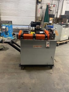 Shuster #18SFT, dual arbor wire straightener, 25-150 FPM, dual counter rotating arbors, 2 exit rolls, 1982
