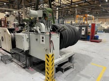 6000 lb. FE #PF-6000-08-BW, 8" mandrel diameter, 7' max width of coil, integrated butt welder