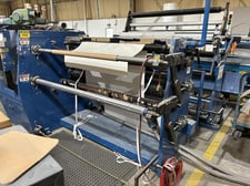 Deacro #DA-653, 63" wide duplex cantilevered slitter rewinder, edge guiding, pnematic braking