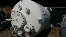 1500 gallon Teflon Lined Carbon Steel Reactor, 5.83' diameter x 5' straight side, 2" Center Bottom Outlet, 30