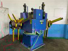 5000 lb. Arku #AH5000/2, double end coil reel & precision leveler, 12" width, 80" outside dimensions, 14"-20"