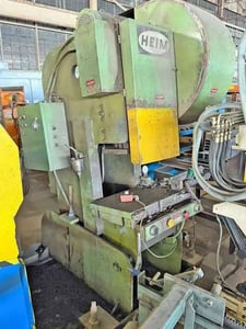 70 Ton, Heim #7A, OBI press, tooled with flying cutoff die, air cylinder die return, 4 dies