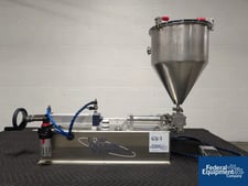 Liquid Packaging Solutions #330-510-1, Piston Filler, Stainless Steel hopper, foot pedal