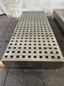 96' -1/2" L x 37' -1/2" W x 8" thick Acorn welding table