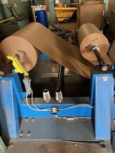 Kraft Paper roll wrapper, 65" wide, compact, scale, rollers w/ejector, up ender, unwinds