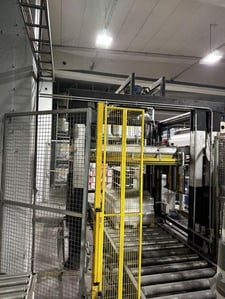 Signode (Haloila) #Octopus-1600BTS, pallet wrapping line with roller conveyor, security fences