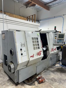 Haas #HL-4, CNC turning center, 10" chuck, 2.5" bar, 34" L x 14.5" diameter turn, 3400 RPM, 30 HP, 12 turret