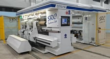 SRC Systems #2010CW, independent arm slitter rewinder, 72"-120" wide, Omron PLC, 2300 FPM, new
