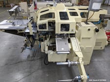 Sig #CL, Chocolate / Candy Bar Wrapper, 150 PPM, Foil & Paper, Cold Glue Sealing, 208 V.