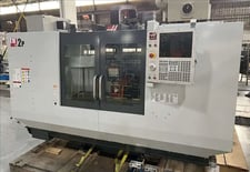 Haas #TM-2P, 40" X, 16" Y, 16" Z, 10000 RPM, 20 automatic tool changer, automatic air gun, chip auger, rigid